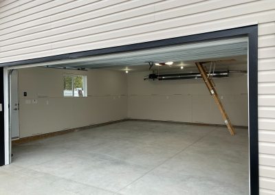 Garage Interior with radiant heater and attic ladder